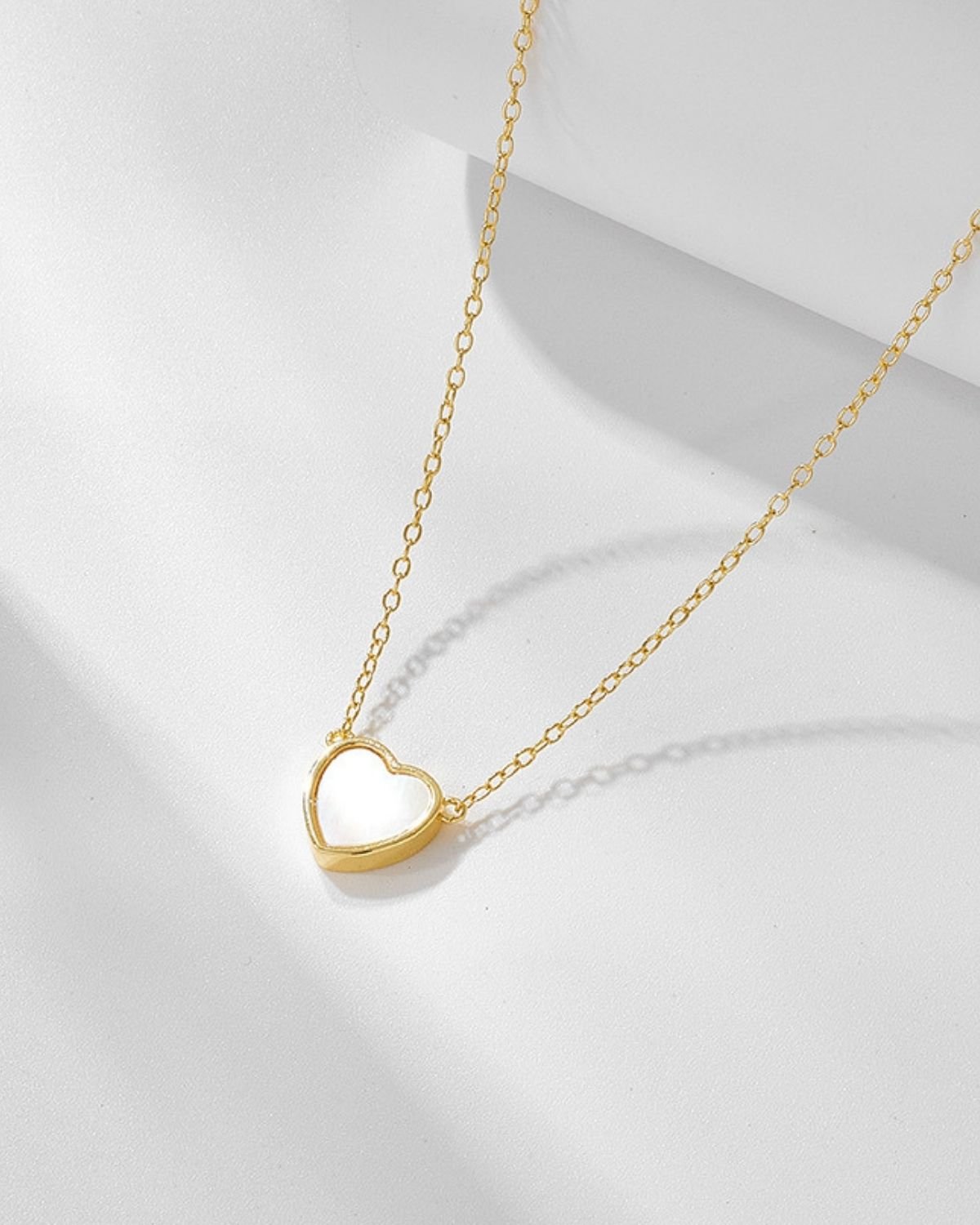 gold-plated-heart-shell-silver-necklace.jpg Gold plated heart shell silver necklace