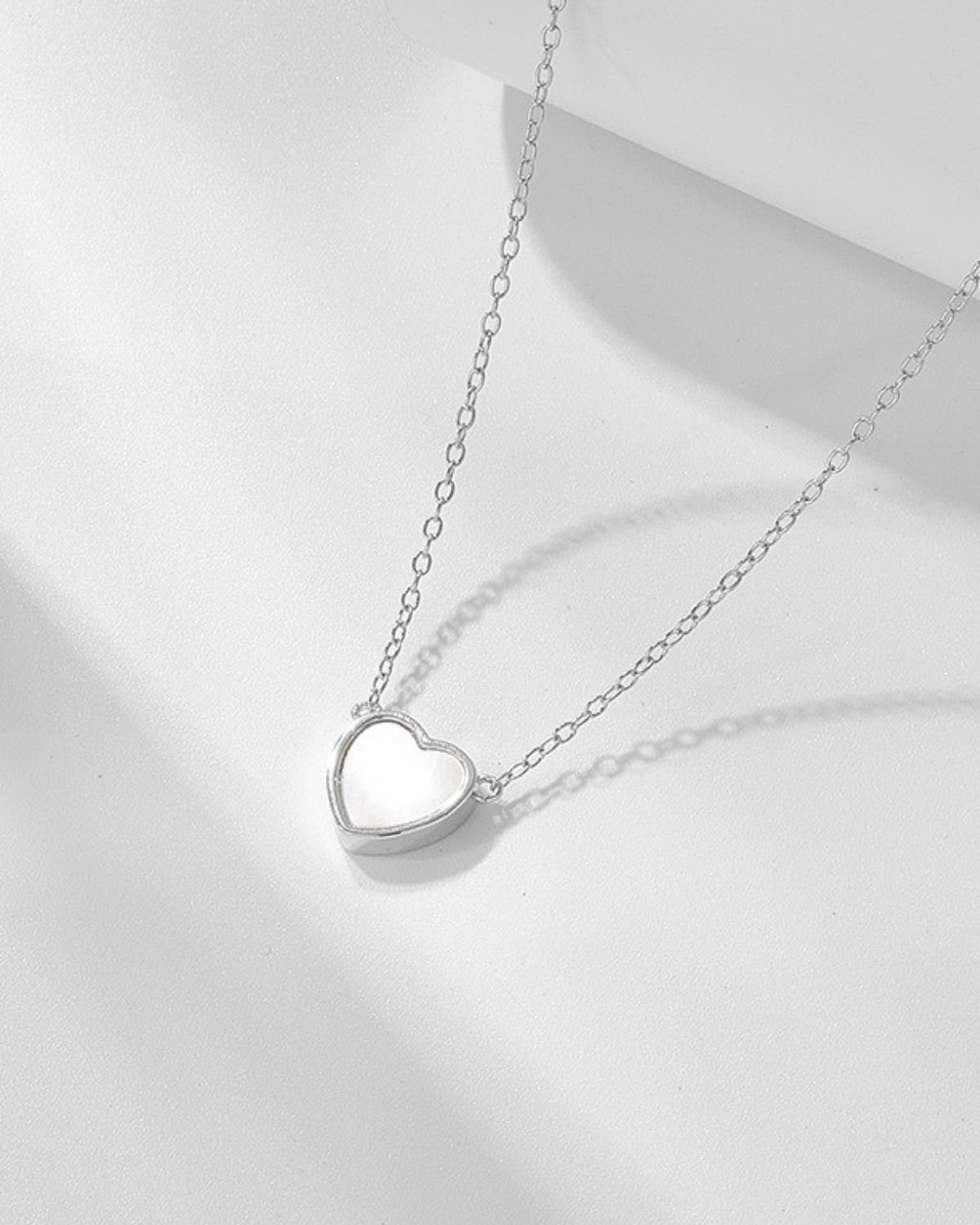 rhodium-plated-heart-shell-necklace.jpg Rhodium plated heart pendant necklace