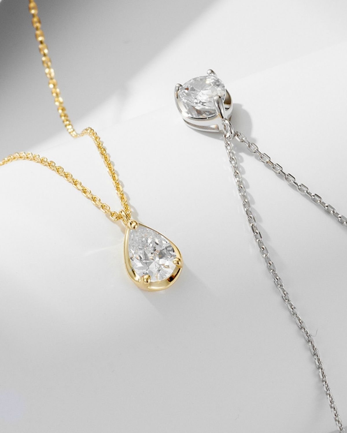 teardrop-halo-pendant-necklace-rhodium-and-gold-plated.jpg teardrop-halo-pendant-gold-and-rhodium-necklace