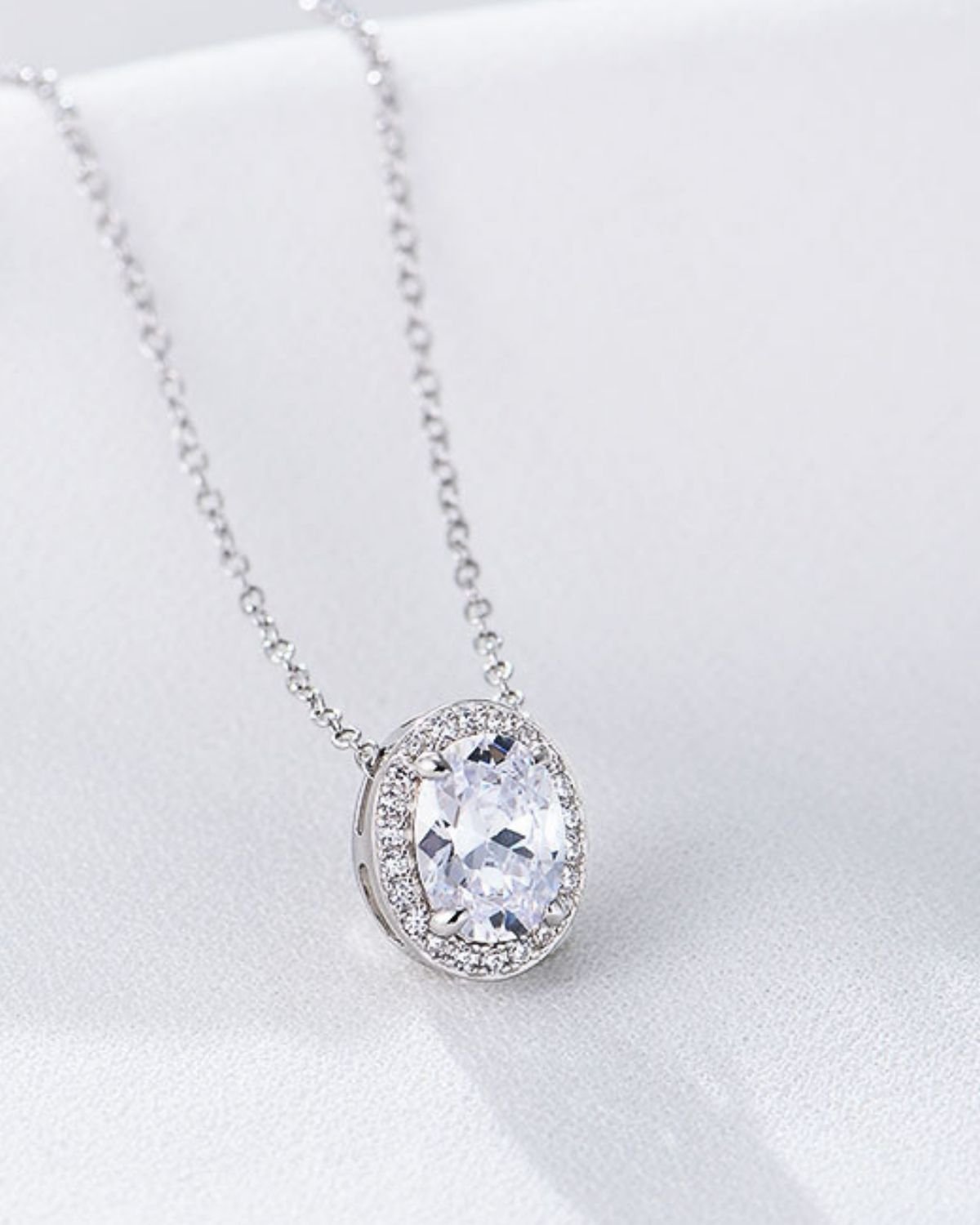 elegant-oval-halo-rhodium-plated-necklace.jpg Elegant oval halo necklace in rhodium