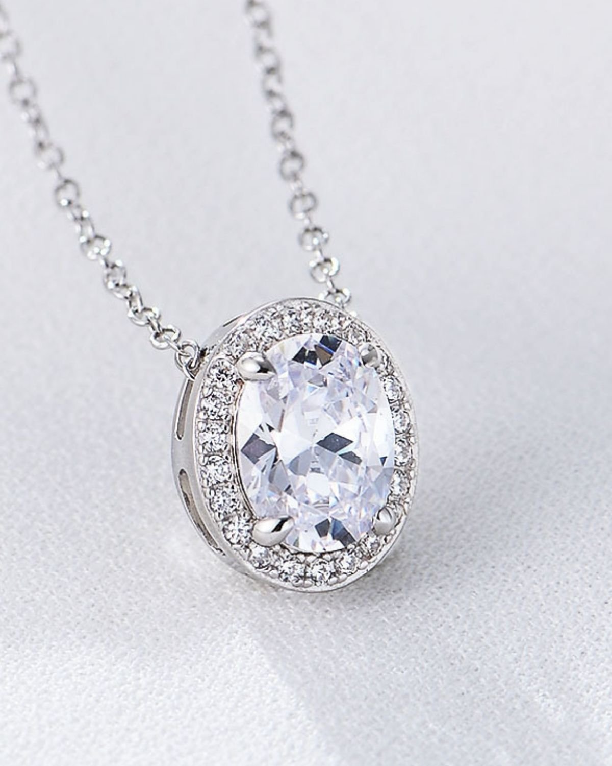 sterling-silver-oval-halo-pendant.jpg Sterling silver oval halo pendant necklace