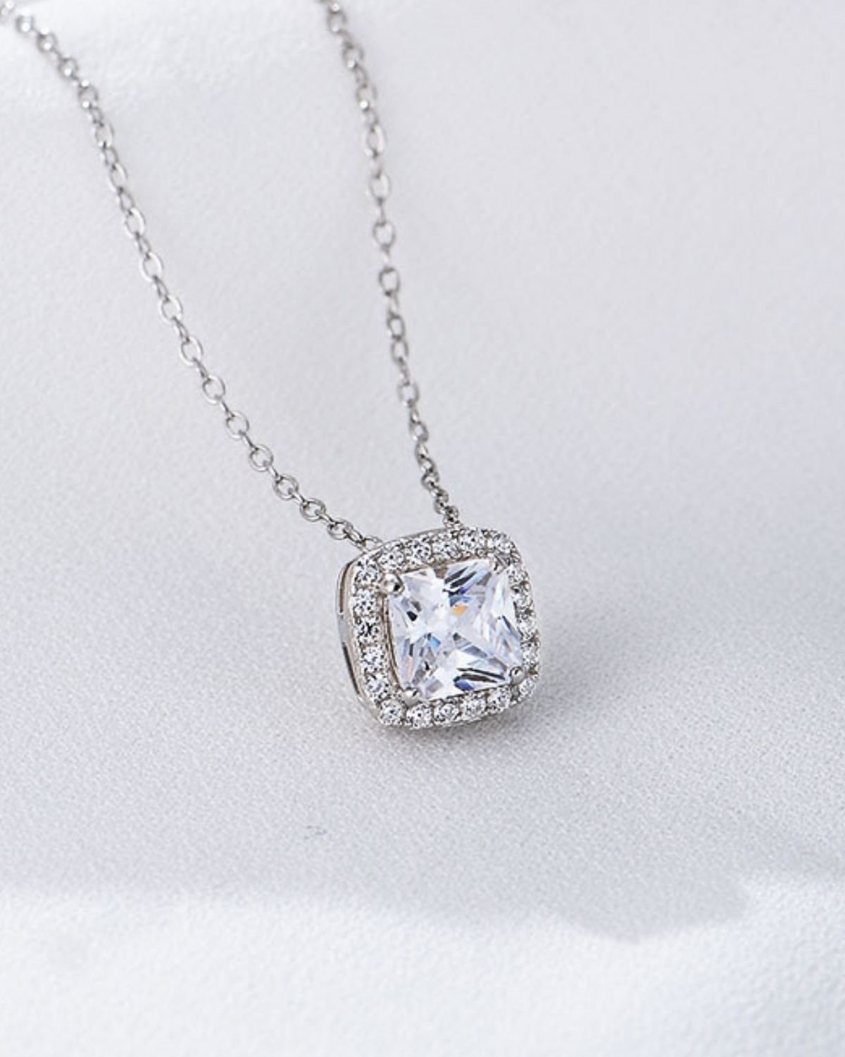 White zircon square halo pendant necklace square-halo-pendant-necklace.jpg